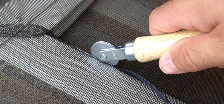metal screen door repair in Tweedsmuir